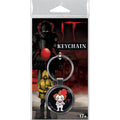 Keychain packaging featuring a character with a red balloon and text 'IT' on a dark background.
