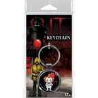 Keychain packaging featuring a character with a red balloon and text 'IT' on a dark background.